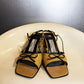 Vintage 90s Balenciaga Paris two tone beige and black square toe bow sandals front view