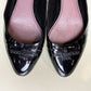 Top view showing pink leather lining of vintage Louis Vuitton ballet flats.